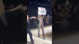 A PETA supporter dripping in blood infiltrated the Giorgio Armani fashion show on Madison Ave…